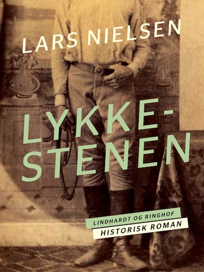 Lykkestenen – omslag til lydbogen af Lars Nielsen